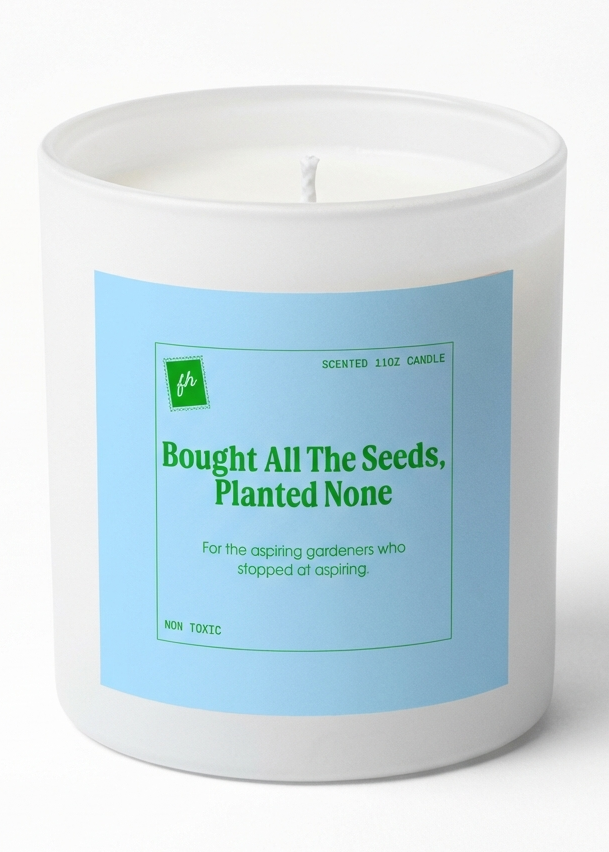 White candle with a blue label on a white background